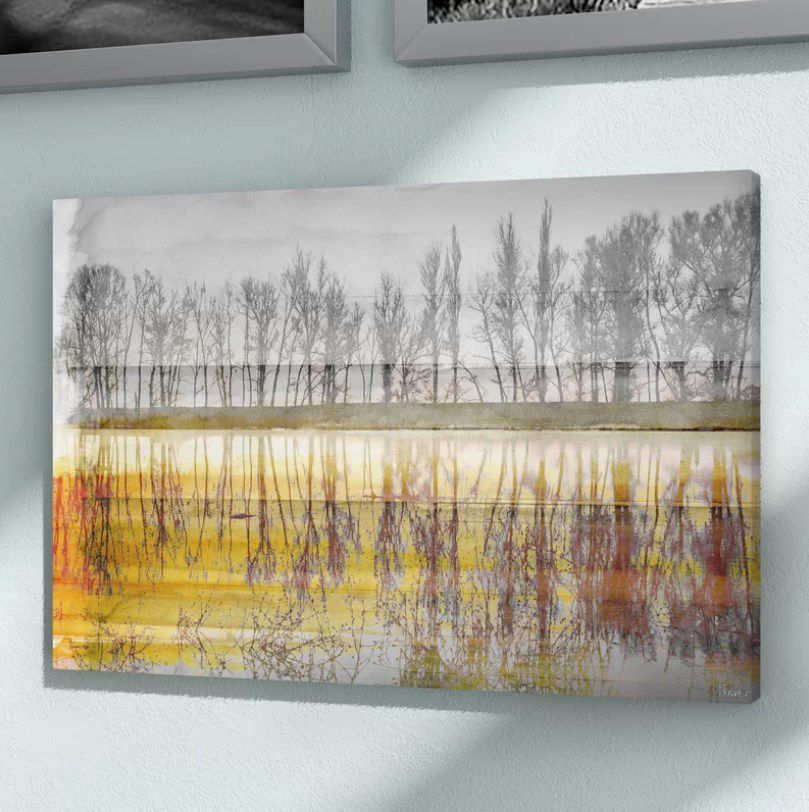 Bring an autumn scene inside with this framed canvas